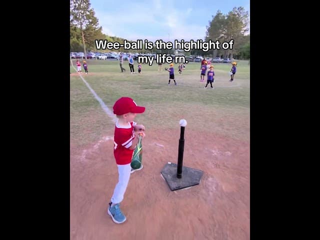 T-Ball player hits ball and then chases after it, coach has to get him off the dogpile!