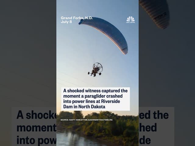 A shocked witness captured the moment a paraglider crashed into power lines in North Dakota